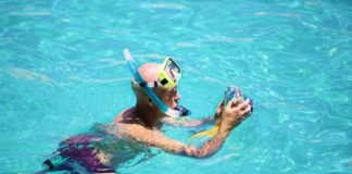 Best underwater camera for snorkeling in 2023 Underwater amateur photographer taking pictures