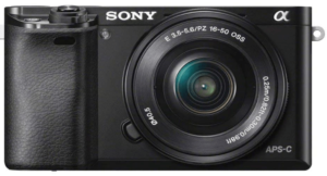 This is an image of a black Sony Alpha a6000 Mirrorless Digital Camera 24.3MP SLR Camera with 3.0-Inch LCD and w/16-50mm Power Zoom 