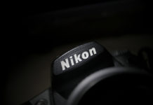 Best Nikon D3500 Bundle Deals this is an image of a Nikon logo on a DSLR camera