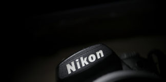 Best Nikon D3500 Bundle Deals this is an image of a Nikon logo on a DSLR camera