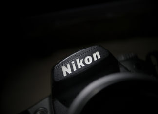 Best Nikon D3500 Bundle Deals this is an image of a Nikon logo on a DSLR camera