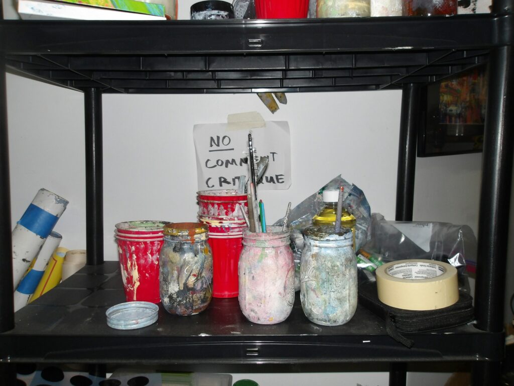Kodak PIXPRO WPZ2 sample photo of paint jars on a studio shelf