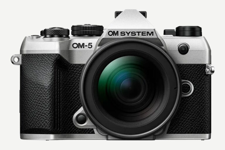 Silver OM System OM-5 Mark II mirrorless camera with 12-45mm lens